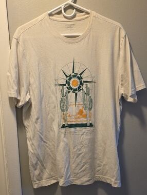Desert Compass Graphic Tee — Cream with Green & Orange Print